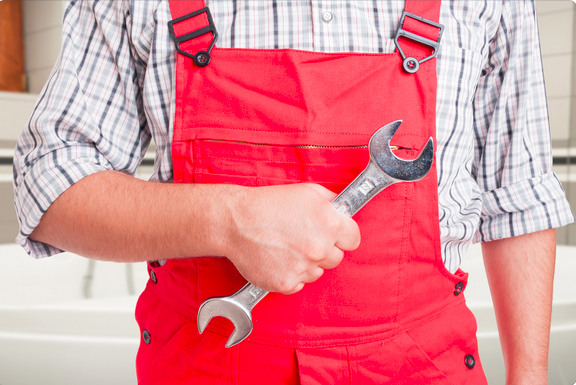 Plumber mate installing a new pipe