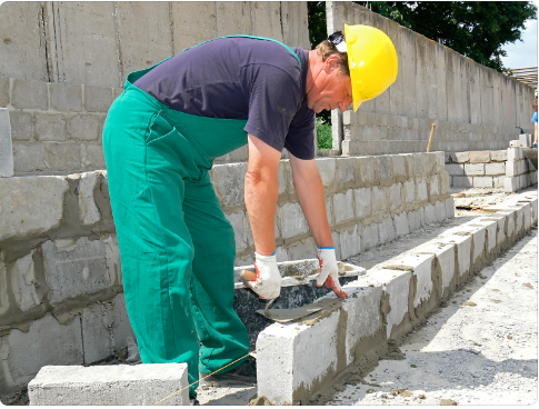 Skilled bricklayer working on a construction site