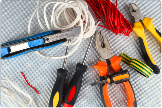 Electrician reviewing blueprints