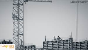 Construction labourers working on a busy site