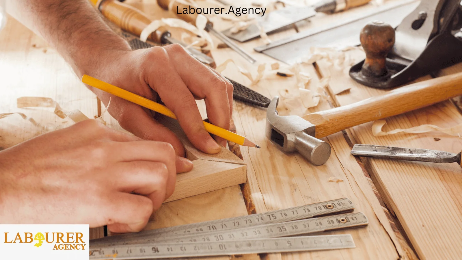 A team of carpenters discussing plans on a construction site