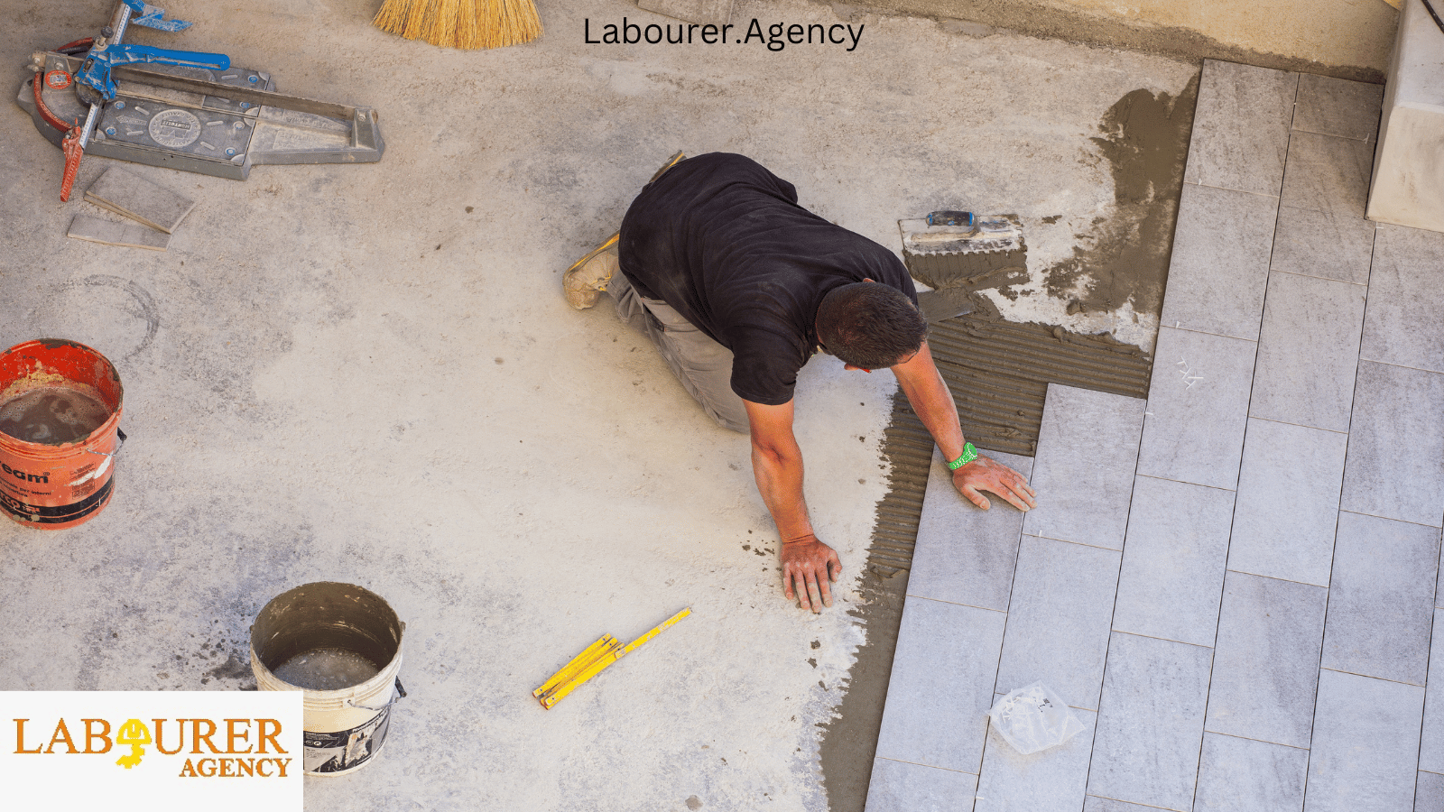 Site operative using power tools on a construction site